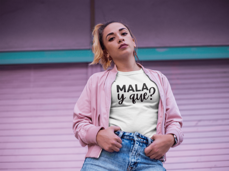 mala y que of a trendy latina wearing a t shirt and a pink jacket on the street a18552 768x576